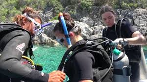 Couple Scuba Diving (Boat Dive)